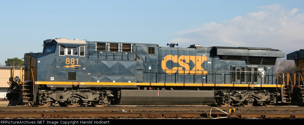 CSX 881 sits in the yard with other ES44AC's